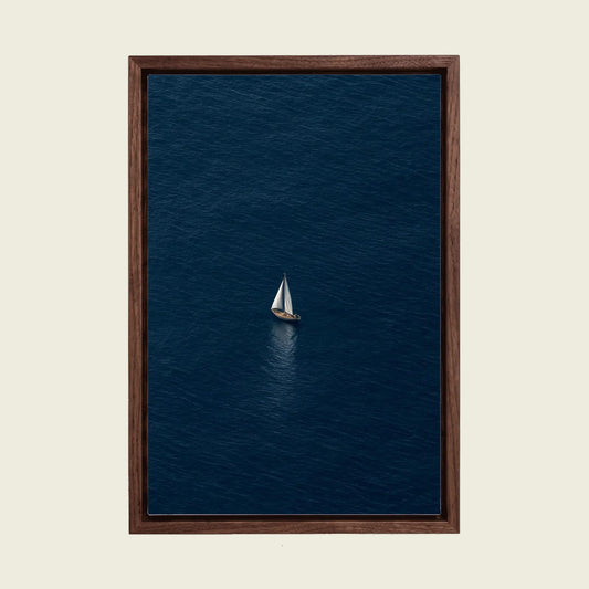 Sailboat on the Deep Blue Sea canvas wall art in a floating walnut frame