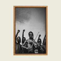 African Children II canvas wall art in a floating oak frame