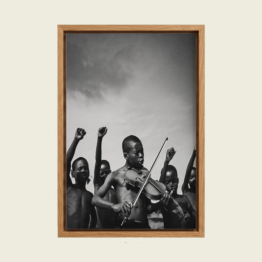 African Children II canvas wall art in a floating oak frame