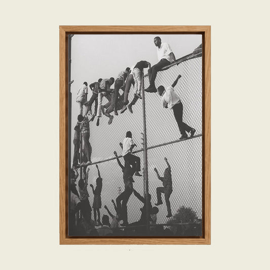 African Children I canvas wall art in a floating oak frame