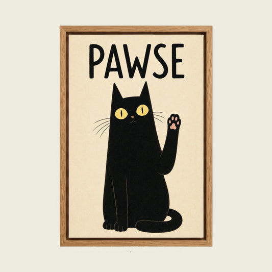 PAWSE Black Cat canvas wall art in a floating oak frame