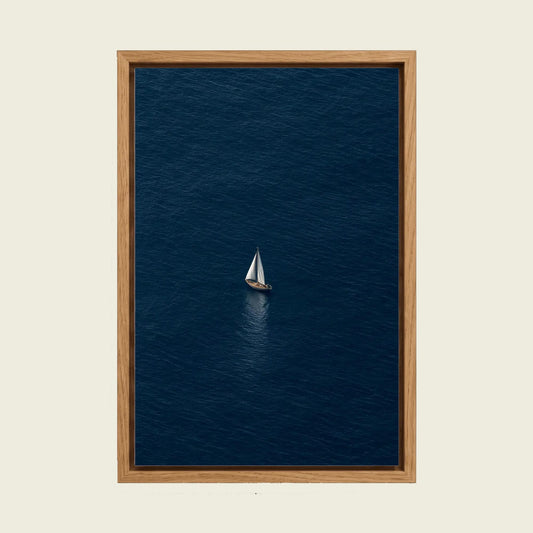 Sailboat on the Deep Blue Sea canvas wall art in a floating oak frame