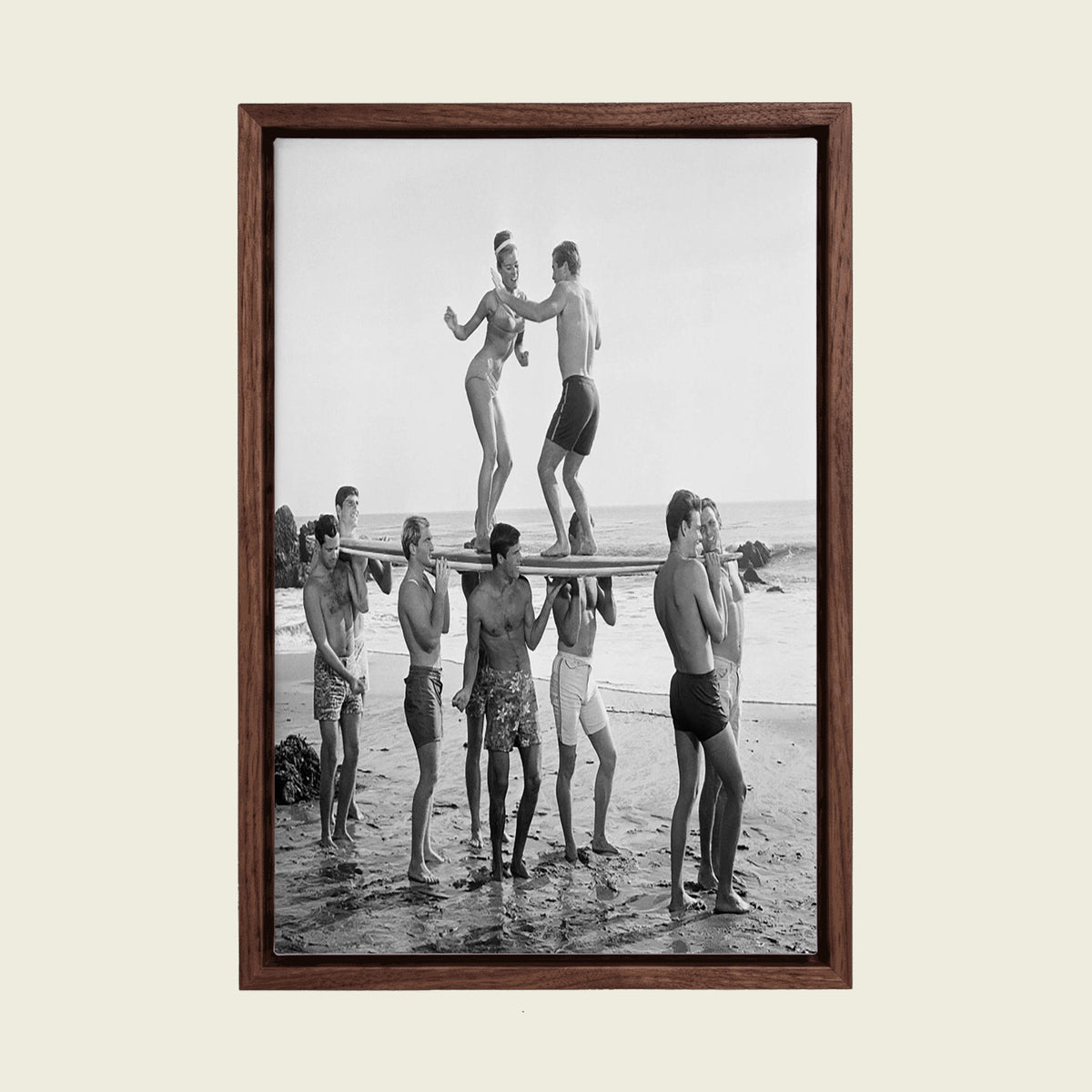 Surfers Beach Party canvas wall art in a floating walnut frame