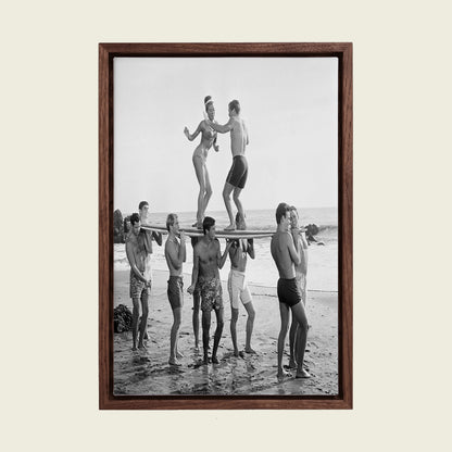 Surfers Beach Party canvas wall art in a floating walnut frame