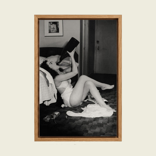 Champagne Woman canvas wall art in a floating oak frame