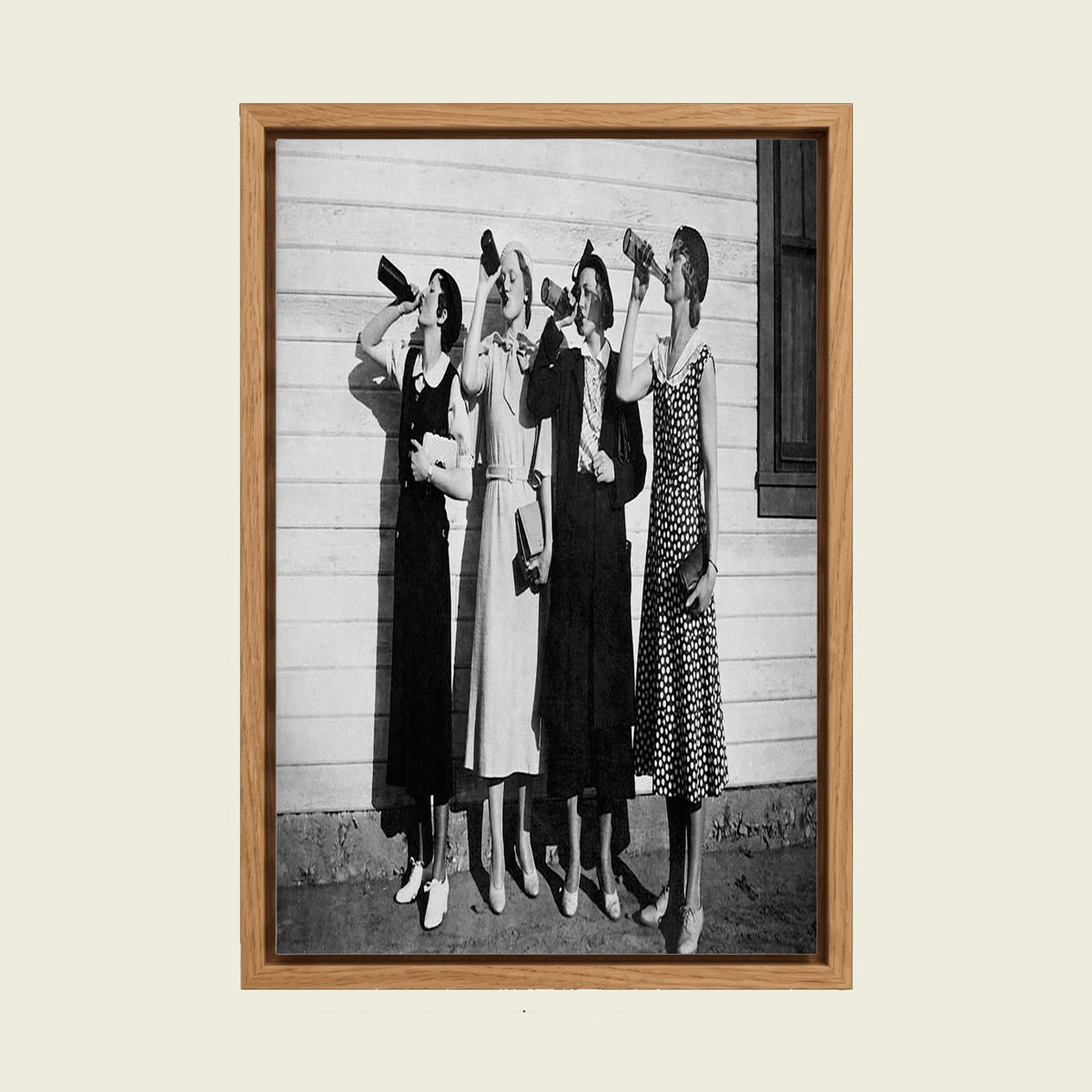 1920s Women Drinking Beer canvas wall art in a floating oak frame